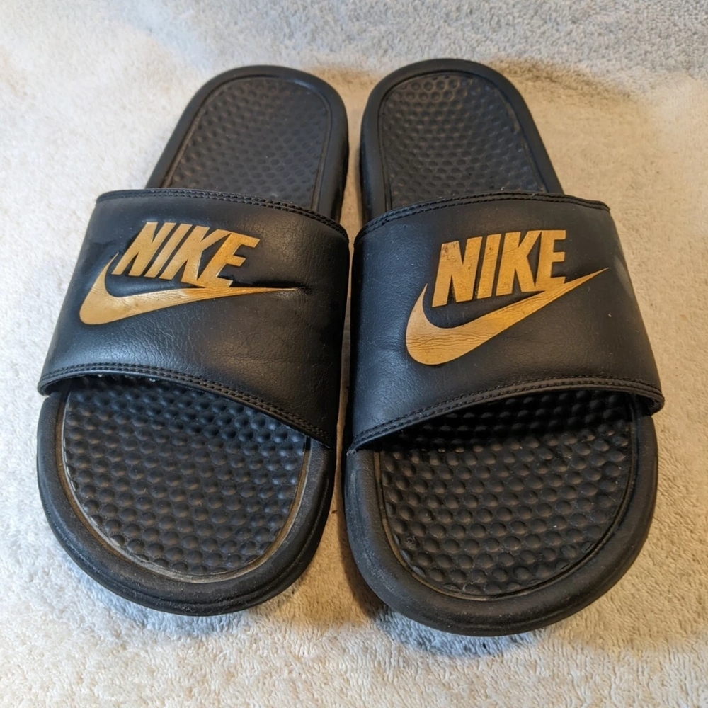 Nike Black and Gold Slide Sandals